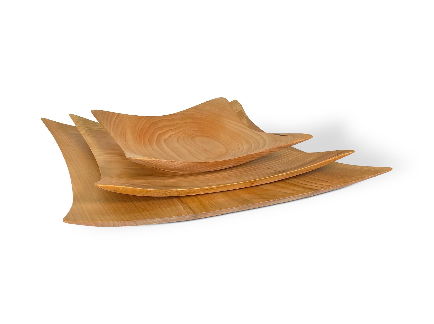 Holz-Platzteller in geschwungener Form